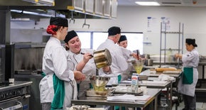 Group of chefs in a kitchen